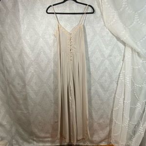Free People nude spaghetti strap jumpsuit with crochet detail on front size 2